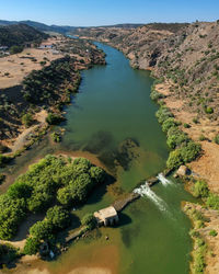 Aerial view from a river with an old water mill. guadiana river in portuga