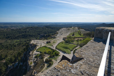 High angle view of castle on landscape against sky