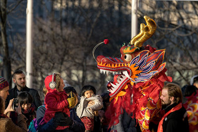 People dancing against blurred background