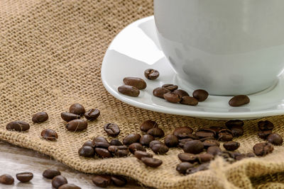 Close-up of coffee beans on table