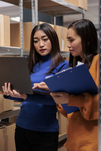 Young woman using digital tablet