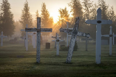 View of cross in cemetery