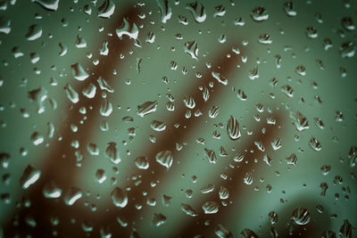 Close-up of water drops on glass