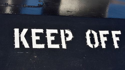 High angle view of text on wall