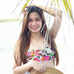 Portrait of smiling young woman