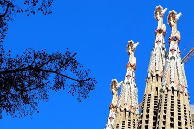 Low angle view of building against blue sky