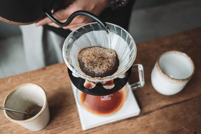 High angle view of coffee cup on table