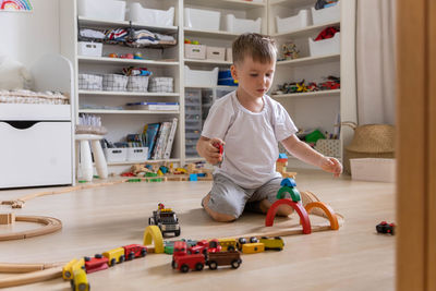 Portrait of boy playing in gym