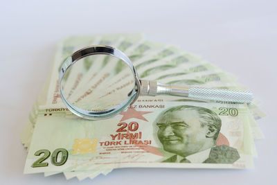 High angle view of coins on table