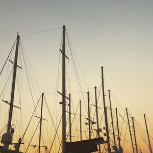 Low angle view of sailboat against sky during sunset