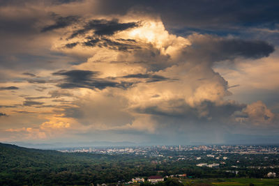 Aerial view of townscape against sky during sunset