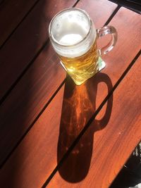 High angle view of beer glass on table