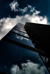 Low angle view of modern building against sky