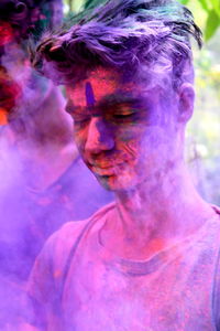 Close-up of man during holi