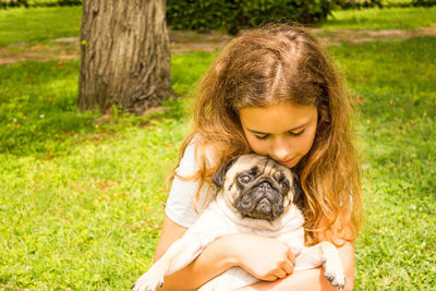 Portrait of a girl with dog