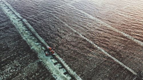 High angle view of working on beach