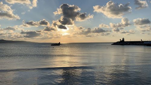 Scenic view of sea against sky during sunset