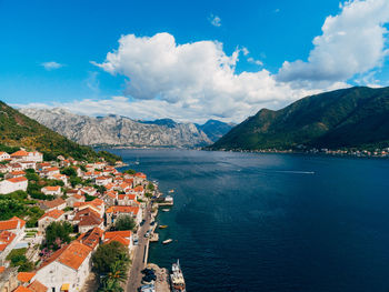 High angle view of townscape by sea