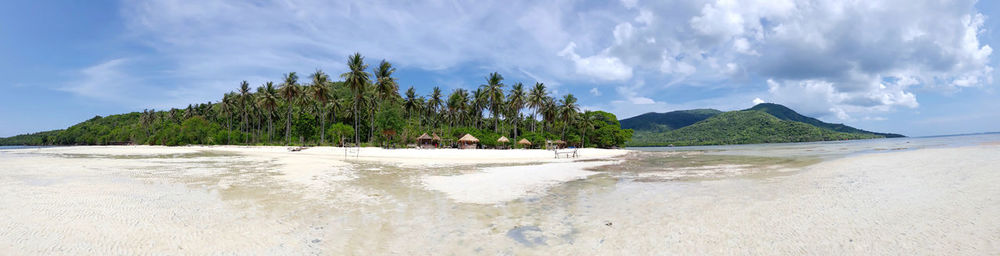 Panoramic view of beach and sea against sky