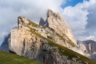 Low angle view of rocks against sky