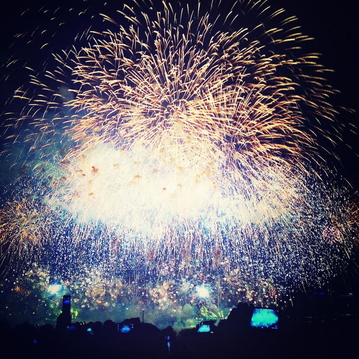 night, firework display, illuminated, sparks, celebration, exploding, arts culture and entertainment, event, firework - man made object, long exposure, motion, glowing, firework, entertainment, blurred motion, fire - natural phenomenon, celebration event, sky, low angle view