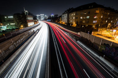 Light trails of vehicles on street at night