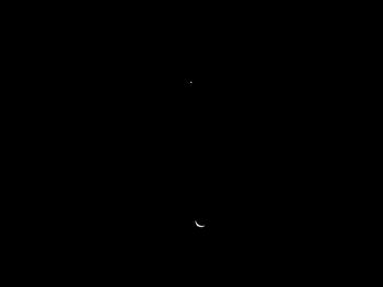 Scenic view of moon against clear sky at night