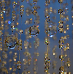 Low angle view of chandelier hanging on ceiling