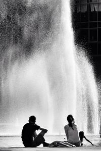 Reflection of woman in water