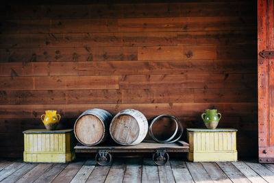 View of old objects on table against wall