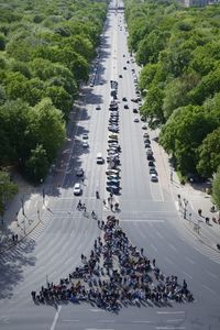 High angle view of people on road in city