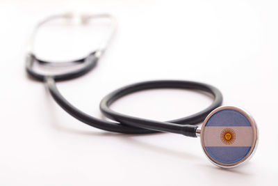 Close-up of stethoscope against white background