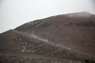 People on deserted mountain