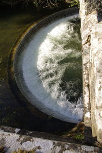High angle view of water flowing from sea