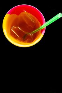 Close-up of drink against black background