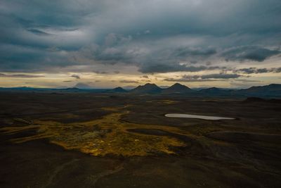 Scenic view of landscape against sky during sunset