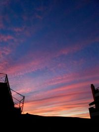 Low angle view of dramatic sky at sunset