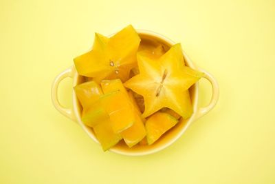 Close-up of fruit over white background