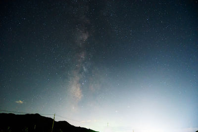 Low angle view of stars against sky at night