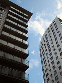 Low angle view of modern buildings against sky