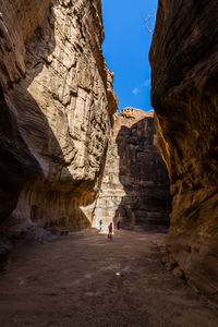 People on rock formation