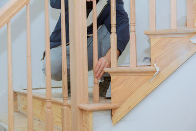 Man working on wood at home