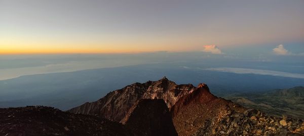 Scenic view from the summit of mt. rinjani during sunrise blue hour