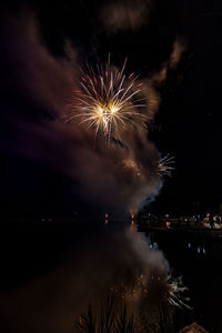 Firework display at night