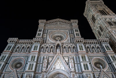 Low angle view of building against sky at night