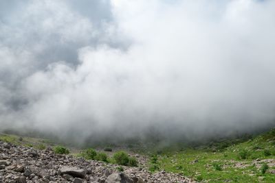 Scenic view of land against sky