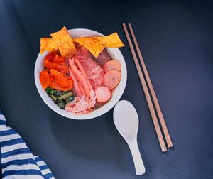 High angle view of chopped vegetables in bowl on table