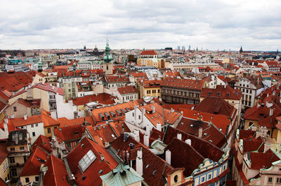 High angle view of townscape against cloudy sky