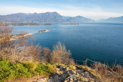 Aerial view of the lake garda with the rabbit island and the garda island from manerba