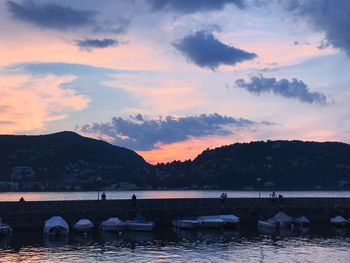 Scenic view of lake against sky during sunset